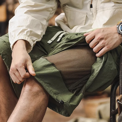 Men's Fashion Mesh Stitching Multi-pocket Elastic Waist Cargo Shorts MTA1380E3Z